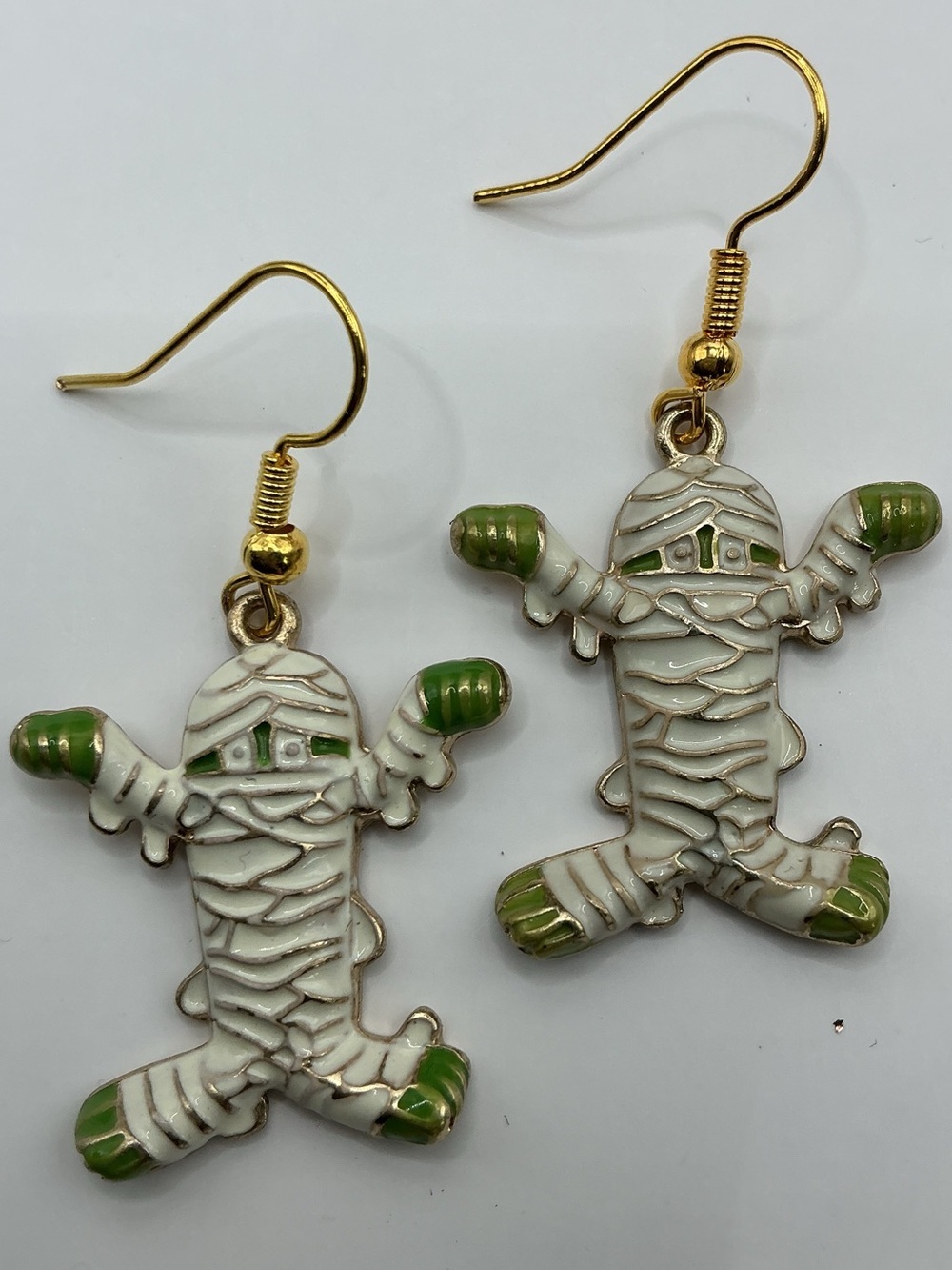ENAMELED CUTE JUMPING MUMMY PIERCED EARRINGS